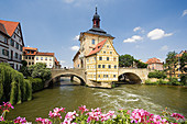 Germany, Bavaria, Bamberg, City Hall on a bridge over Regnitz river.