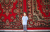 Selling carpets. Turfan bazaar. China.