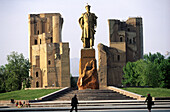Statue of Amir Timur (Tamerlane), Turkic conqueror, and Ak-Saray Palace. Shakrisabz. Uzbekistan