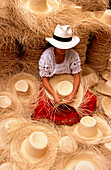 Woman making a Panama Hat . Cuenca. Azuay province. Ecuador
