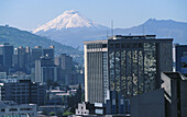 Downtown Quito. Volcan Cotopaxi at the background. Ecuador