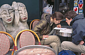 Couple at café terrace. Montmartre, Paris, France
