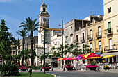 Carles III square and Santa Maria de la Ràpita church. Sant Carles de la Ràpita. Tarragona. Spain.