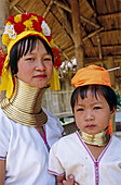 Long Neck karen woman and girl (Myanmar). Giraffe women. North tribes. Tha Ton. Chiang Mai province. Thailand.