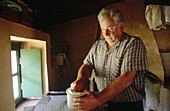 Shepherd making cheese. Gorbea mount. Álava. Vizcaya. Euskadi. Spain.