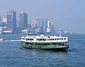 Star ferries crossing Victoria harbour. Hong Kong.