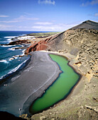 El Golfo green Lagoon. Volcanic beaches. Parque Nacional de Timanfaya. Lanzarote. Canary Islands. Spain