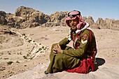 A soldier from the desert trops at The Urn Tomb in Petra. Jordan
