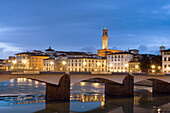 The Lungarni (Arno riverside) with the bell-tower of Palazzo Vecchio. Firenze. Italy