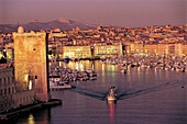 Overview on Vieux-Port at dusk, Fort St Jean on left, Marseille, France