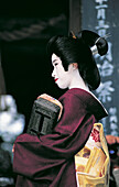 Profile of a Maiko (geisha apprentice). Kyoto. Japan