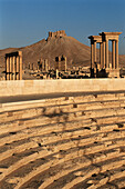 Ruins of the old Greco-roman city of Palmira. Theater benches at fore. Syria