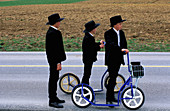 Boys on bikes. Amish County. Lancaster. Pennsylvania. USA