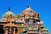 Detail of roof decorated with gods and goddesses statues at Hindu temple. Singapore