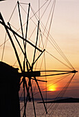 Windmills at dusk. Mykonos. Greece