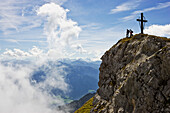 Mounaineers on summit, Haidachstellwand, Rofan mountains, Tyrol, Austria