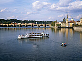 Tour boat on river Vlata . Prague. Czech Republic