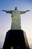 The Corcovado Christ sculpture at dusk. City of Rio de Janeiro. Brazil