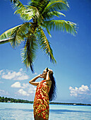 Local woman by the lagoon. Takapoto atoll. Tuamotu archipelago. French Polynesia