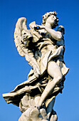 The angels statues by Bernini along the San Angelo bridge. City of Rome. Lazio. Italy