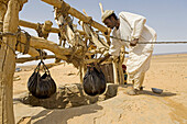 Bedouins at well on the trail from Karima to Atbarah through the Bayyudah Desert. Upper Nubia, ash-Shamaliyah state, Sudan