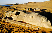 Egypt, Nubia desert, Statue of pharaoh Ramasses II lying in sand, Wadi El-Sebua temple