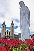 Bosnia-hercegovina. Medjugorje. St James church and statue of virgin mary