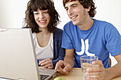 Girl and boy with laptop