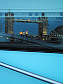 Building with Tower Bridge reflected on, London. England, UK