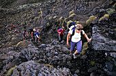 People hiking on the Tongariro Crossing, Tongariro National Park, North Island, New Zealand