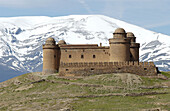 Lacalahorra Castle and Sierra Nevada mountains. Granada province. Spain