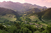 Picos de Europa and Turieno village from Santo Toribio de Liébana monastery. Cantabria. Spain