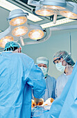 Surgeons at traumatology operating room of hospital