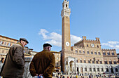 Palazzo Pubblico (seat of civil government) and Torre del Mangia at Piazza del Campo. Siena. Tuscany, Italy