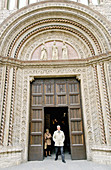 Entrance door to Palazzo dei Priori (aka Palazzo Comunale, town hall) housing the National Gallery of Umbria in Piazza Quattro Novembre. Perugia. Umbria, Italy