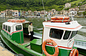 Boat crossing from Pasajes de San Juan to Pasajes de San Pedro, Pasai Donibane. Guipuzcoa. Euskadi. Spain.