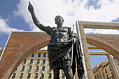 Statue of Caesar Augustus by Roman walls remains, Zaragoza. Aragón, Spain