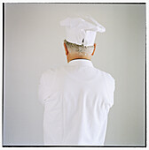  Adult, Adults, Baby boomer, Baby boomers, Back view, Cap, Caps, Chef, Chefs, Clean, Color, Colour, Contemporary, Cook, Cooks, Costume, Costumes, Gray-haired, Grey-haired, Headgear, Human, Indoor, Indoors, Inside, Interior, Job, Jobs, Male, Man, Medium-sh