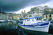 Stormy weather over old harbour. Bastia, Corsica Island. France