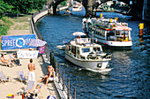 Summer beach and tour boats on Spree River. Berlin. Germany