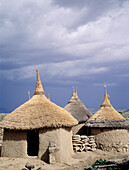 Family compound of adobe cabins and straw roofs. Matakam tribe (aka Mafa or Kirdi ). Mandara Mounts. North Cameroon