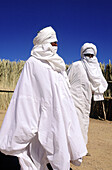 Tuareg men in white dress. Hoggar Mountains. Sahara. South Algeria