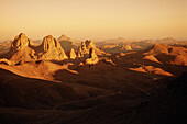 Atakor Mountains seen from father Charles de Foucault ermitage at sunset. Assekrem col. Hoggar, Sahara desert. Algeria