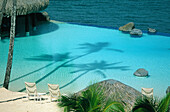 Swimming pool and lagoon. Hotel Beachcomber. Punaauia. Tahiti. French Polynesia