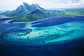 Aerial of Bora Bora island and lagoon, Leeward Islands. French Polynesia