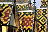 Ceramic tiles roof of Hotel Dieu (1443). Beaune. Burgundy. France