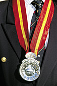 Chevalier du Tastevin wearing his silver Tastevin badge. Clos Vougeot. Cote de Nuits. Cote d Or. Burgundy. France