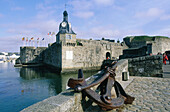 Old town ramparts and ancient anchor. Concarneau. Finistere. Brittany. France