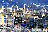 Old harbour and Baroque cathedral in background. Bastia, Corsica Island. France