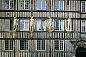 Half-timbered medieval house ornamented with stone statues. Rouen. Seine-Maritime. Normandie. France
